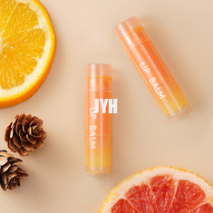 ISO OEM ผลิตภัณฑ์ดูแลผิว Orange Anti Drying Lipstick Lip Lines Treatment Lip Balm