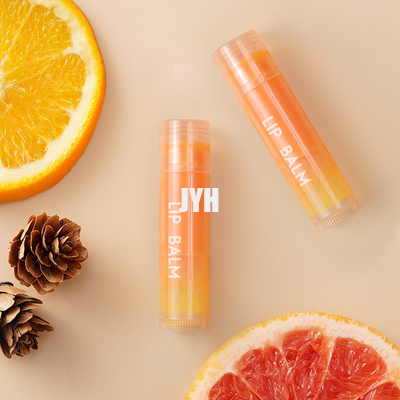 ISO OEM ผลิตภัณฑ์ดูแลผิว Orange Anti Drying Lipstick Lip Lines Treatment Lip Balm